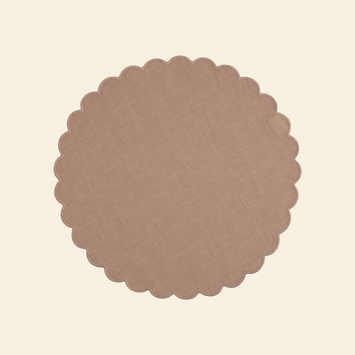 Scalloped round placemats in Powder Pink linen (set of 2) for wholesale on Faire2
