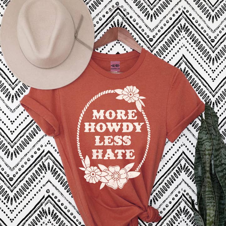 More Howdy Less Hate Tee - Terracotta for wholesale by Ali Dee