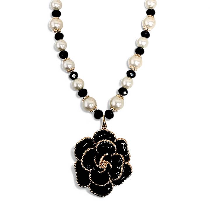 Vintage Black Enamel Flower Pendant Necklace | Coastal Pearl for wholesale by Bijoux Envie Statement Jewelry