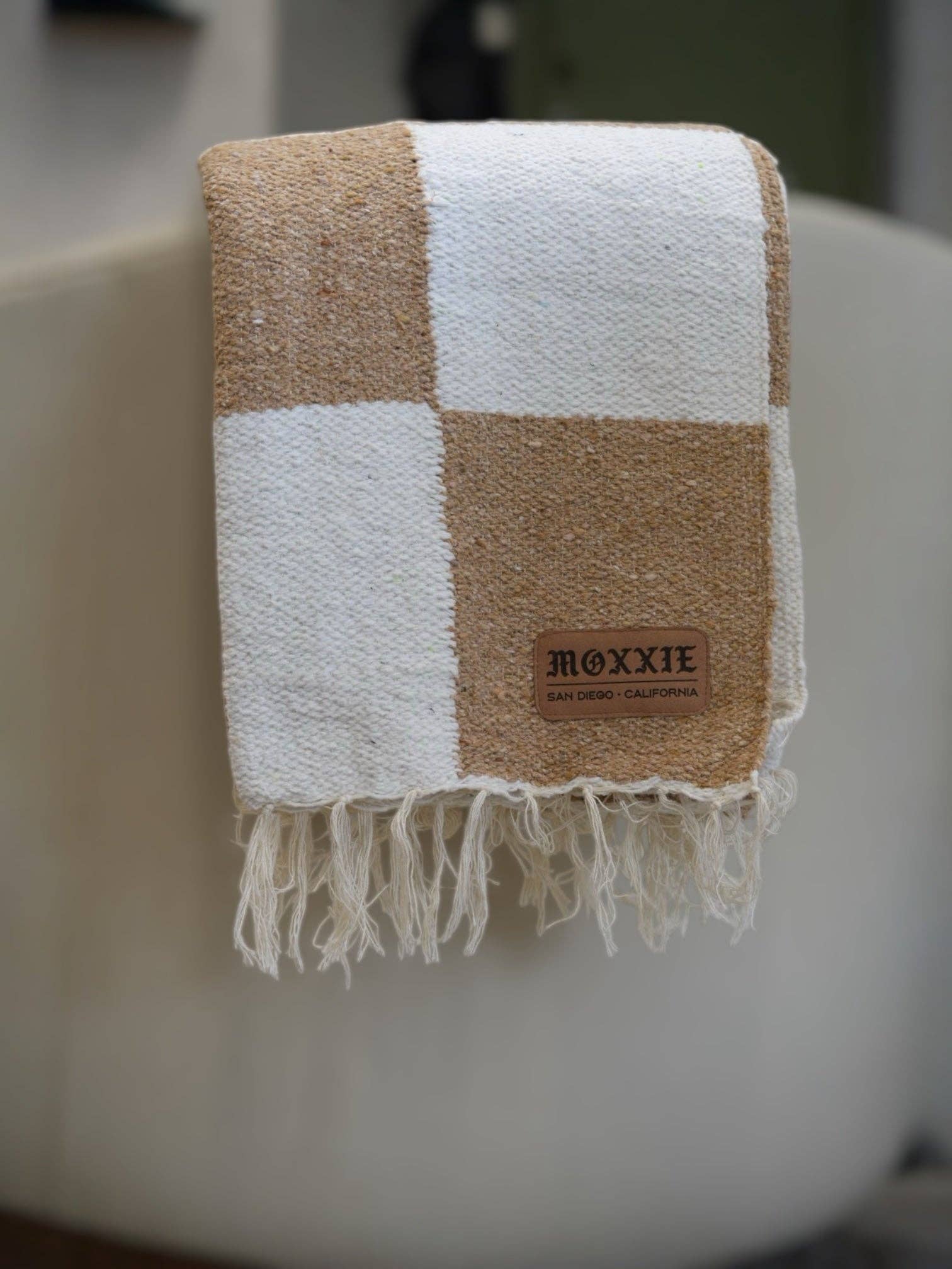 Natural Checkered Baja Blanket for wholesale on Faire4