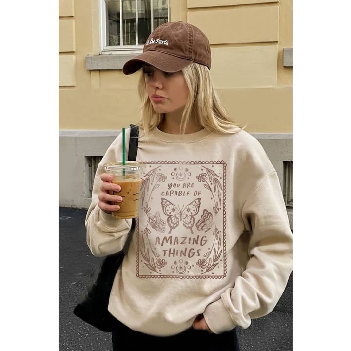 SWEATSHIRT GRÁFICO MINERAL "ÉS CAPAZ DE COISAS INCRÍVEIS" por atacado de HRTandLUV