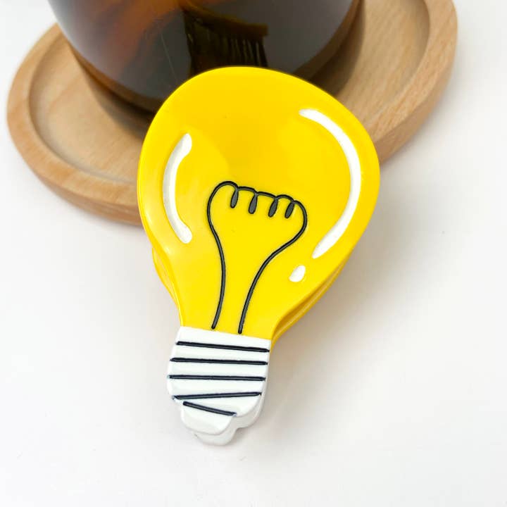 yellow Creative cute light bulb alloy hair clip for wholesale on Faire