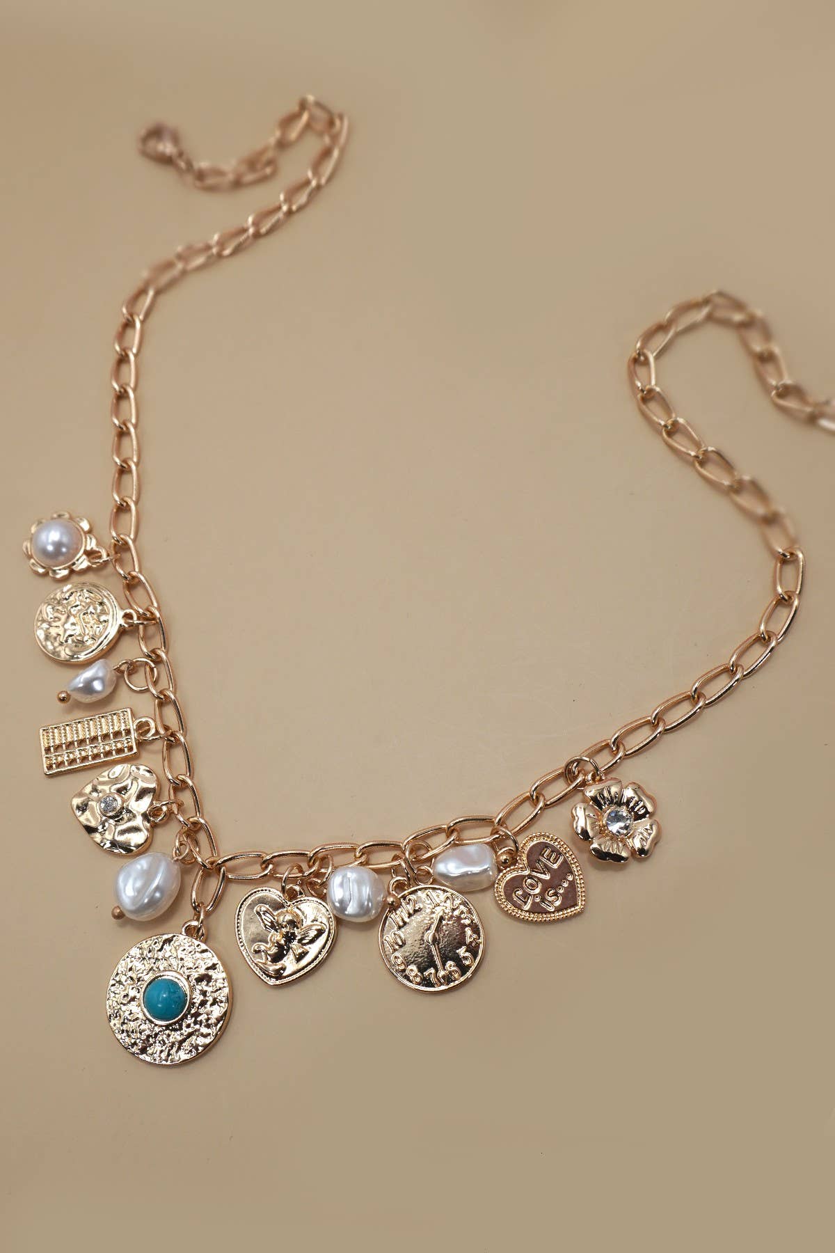 gold CHARM NECKLACE-PEARL HEART TURQ COIN CHARMS | 80N91418 for wholesale on Faire1