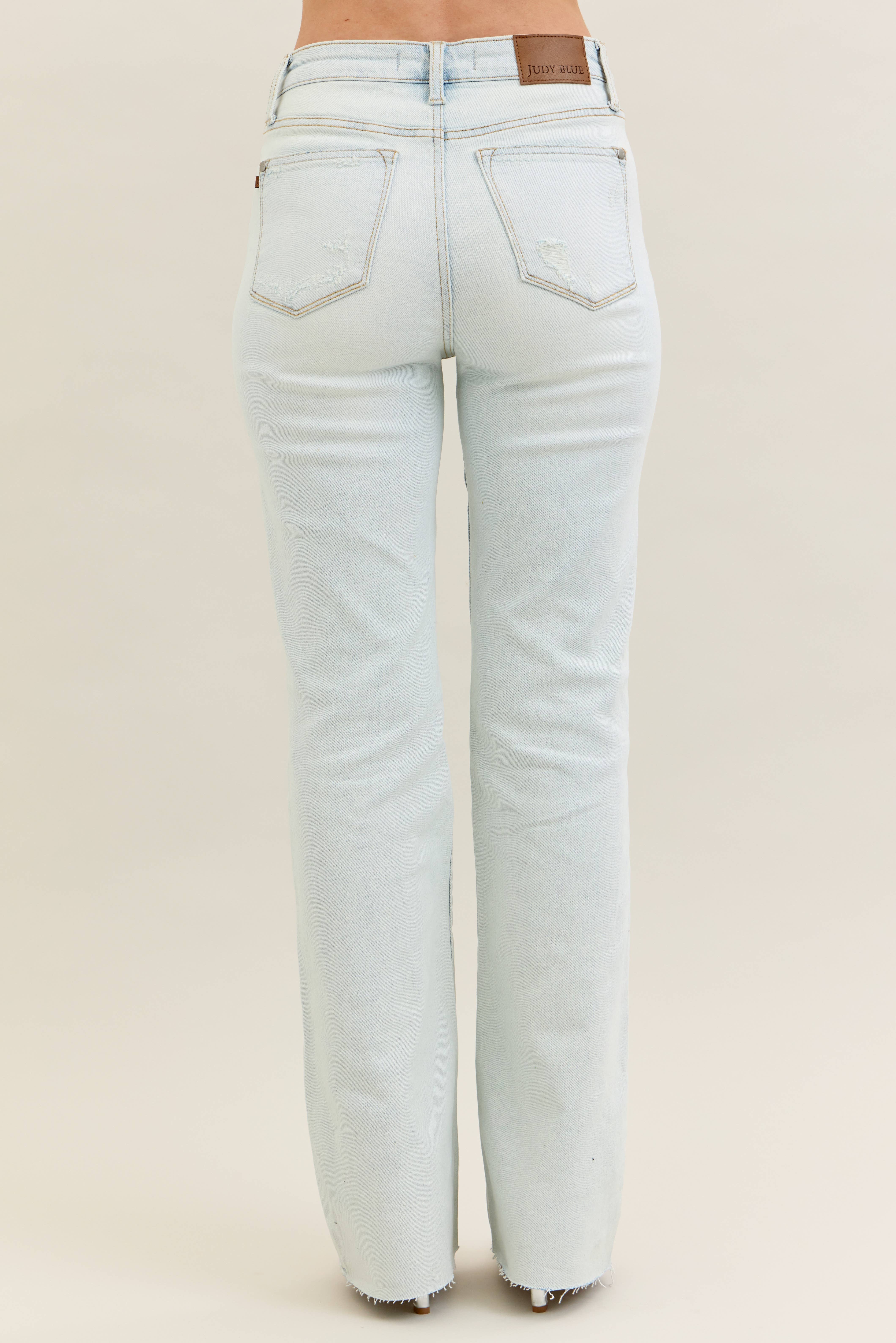 LT Mid Rise Distressed & Fray Hem Bootcut for wholesale on Faire6