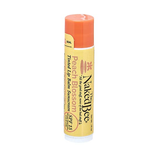 SPF 15 Orange Blossom Honey Tinted Lip Balm in Peach Blossom for wholesale by The Naked Bee