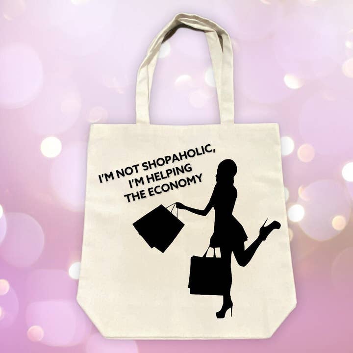 I'M NOT SHOPAHOLIC, I'M HELPING THE ECONOMY TOTE BAG for wholesale by Blue Hearts Designs