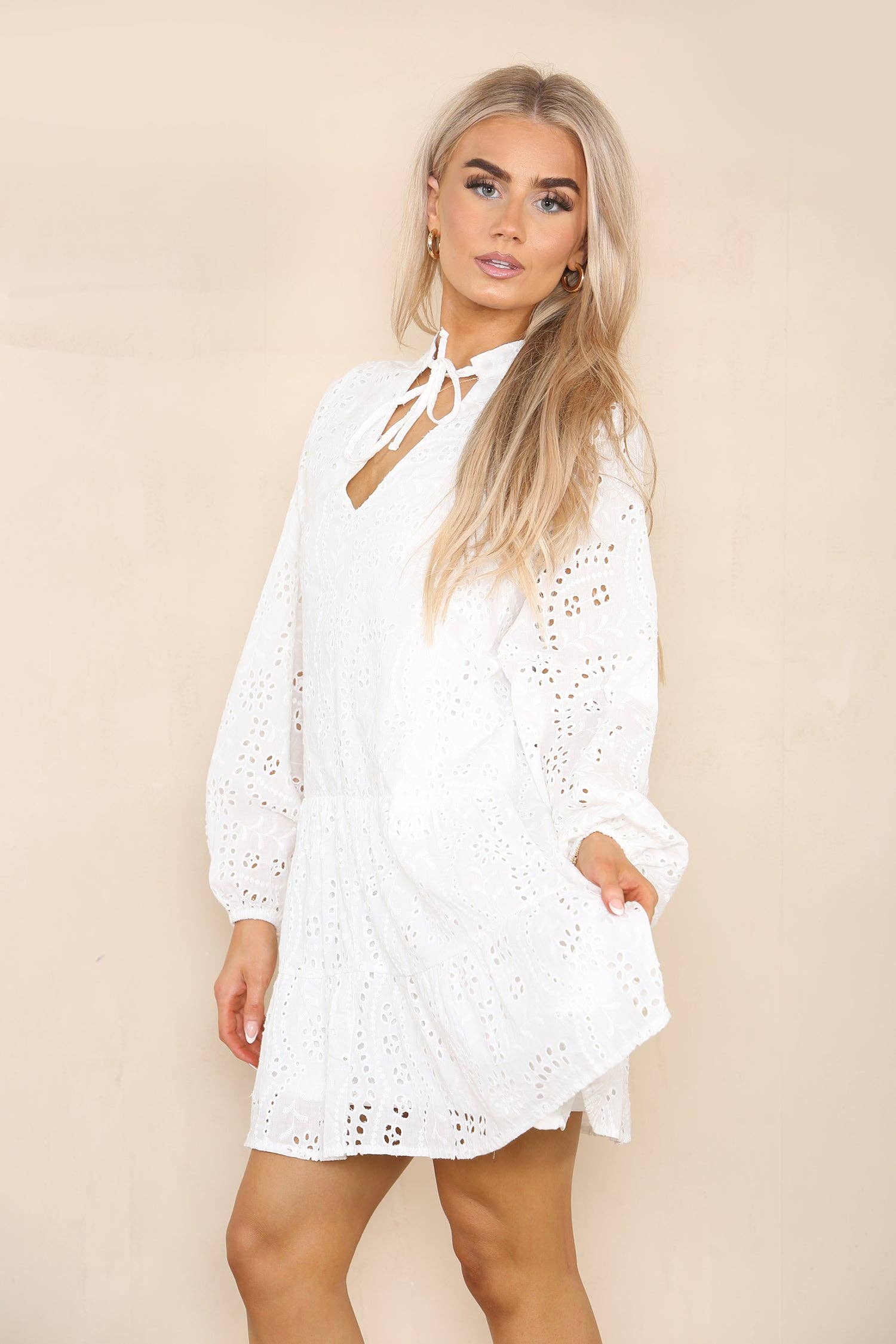 White Eyelet Tie Neck Ruffle Hem Dress for wholesale on Faire2
