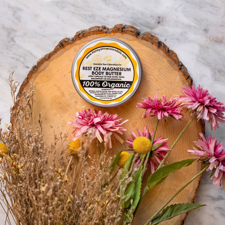 Honey Shine Calendula | Danielle Rae Calendula Co - Vendita all'ingrosso Balsamo/burro per il corpo - Burro per il corpo al magnesio Rest Eze 2 oz2