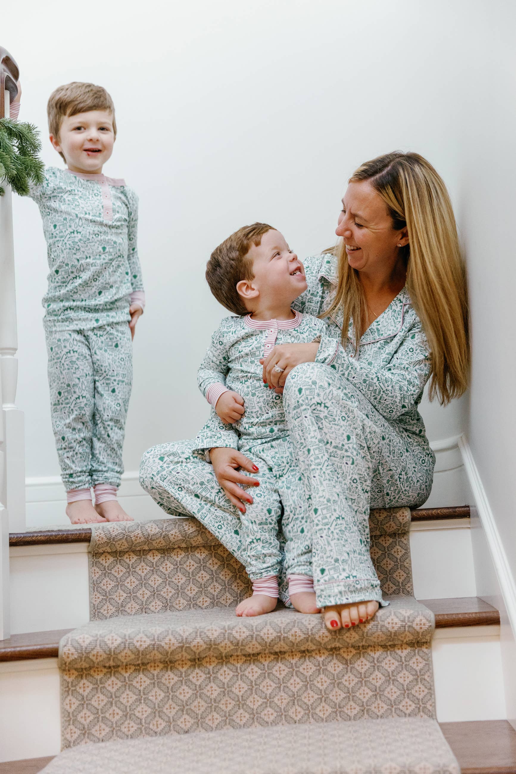 North Pole Christmas Two Piece Kids Henley Pajamas for wholesale on Faire8