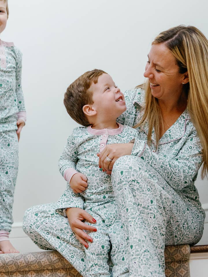 North Pole Christmas Two Piece Kids Henley Pajamas for wholesale on Faire8