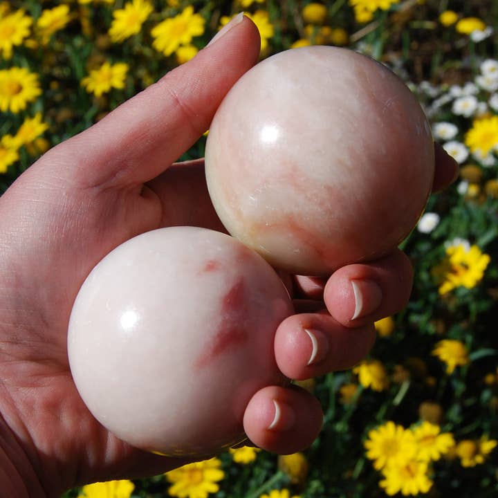 ONE 2.5in Peruvian Pink Opal Crystal Sphere for wholesale by Caspar Curiosities