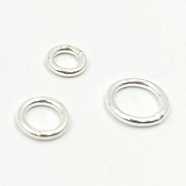 5004481C.925 Sterling Silver Close Jump Rings 20 Gauge 6mm for wholesale by Tresor Jewelry Inc.