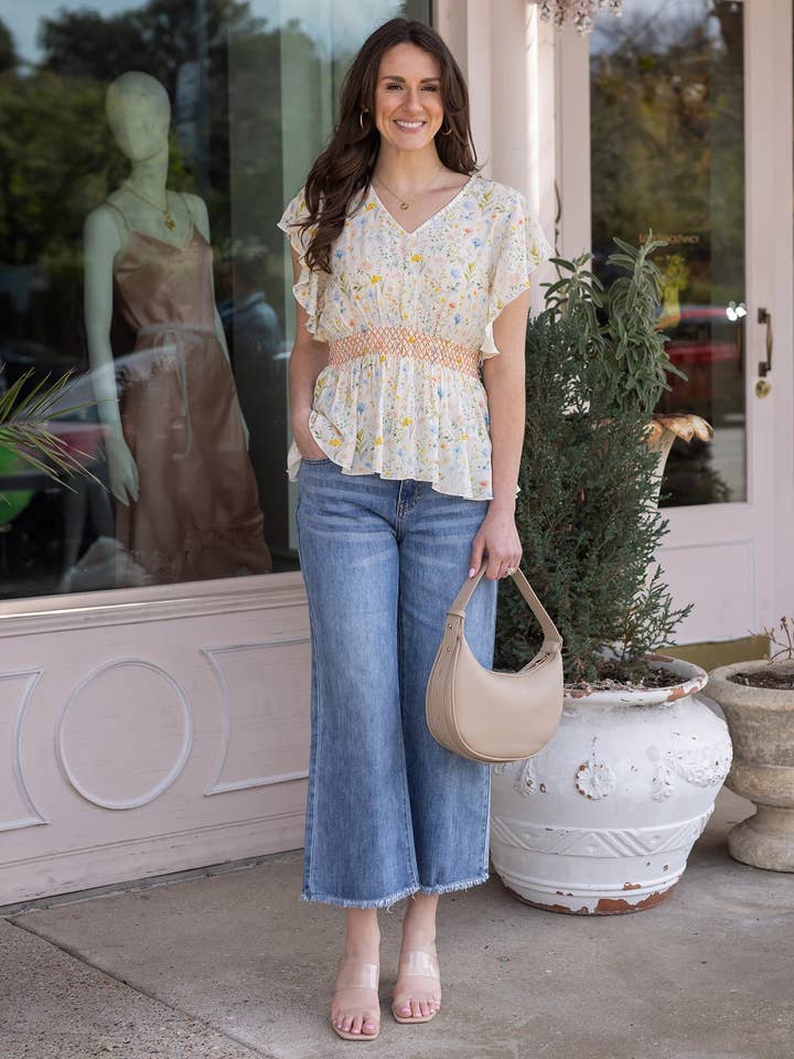 Smocked Flutter Sleeve Top in Watercolor Floral for wholesale on Faire