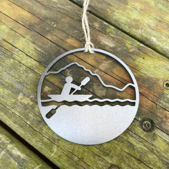 Kayak Mountains Round Christmas Ornament made from Raw Steel for wholesale by BE Creations & Designs, Inc.