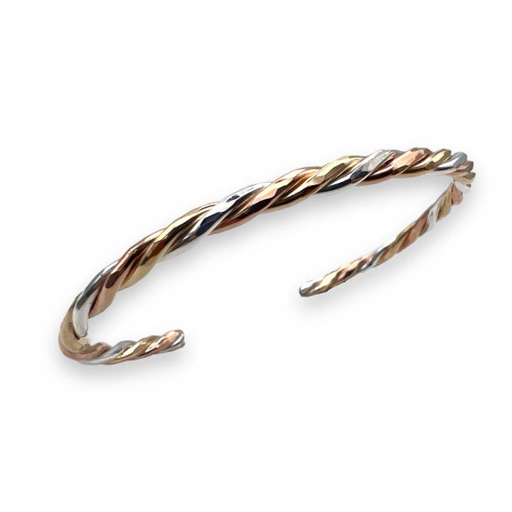 C16TRICO - Twist Cuff Triple Metal Edition för wholesale av Peter James