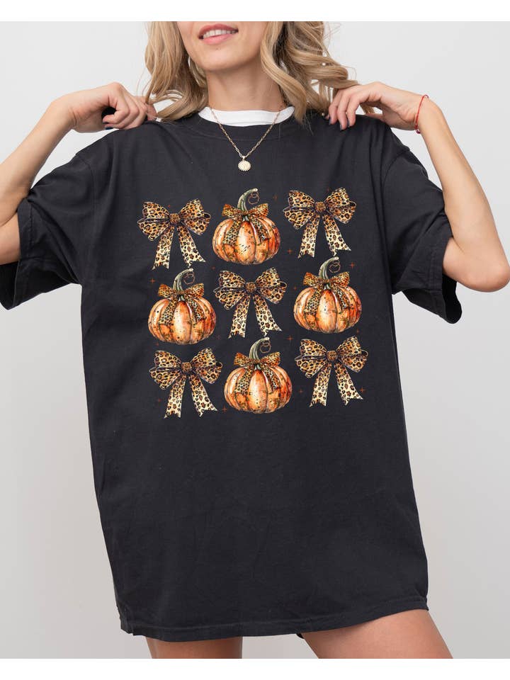 Refinery Number One LLC - Wholesale T-Shirt (Graphic) - Women's - Leopard Print Pumpkins Coquette Ribbons Halloween Shirt
