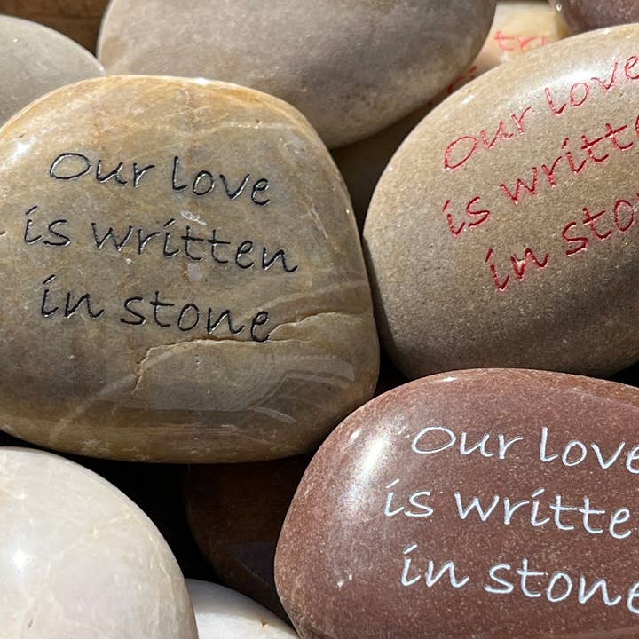 Inspirational Engraved Rock - Our love is written in stone for wholesale by SHOPGIVECOURAGE