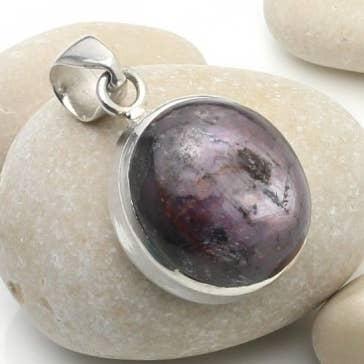 Circular silver pendant with star ruby for wholesale by UniArt