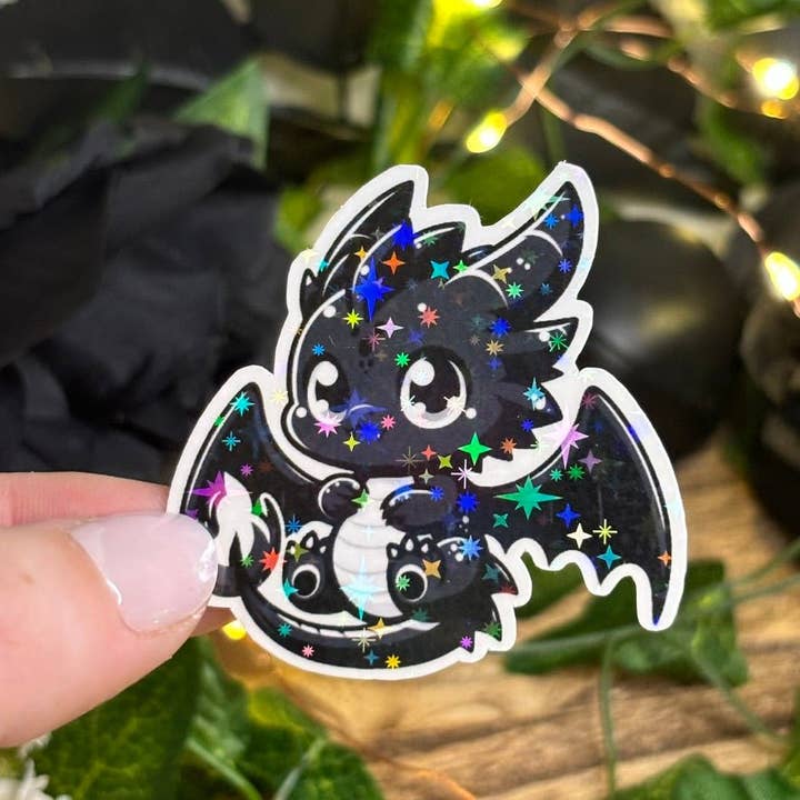 Baby Black Dragon Sparkle Sticker for wholesale by Awfullynerdy.co