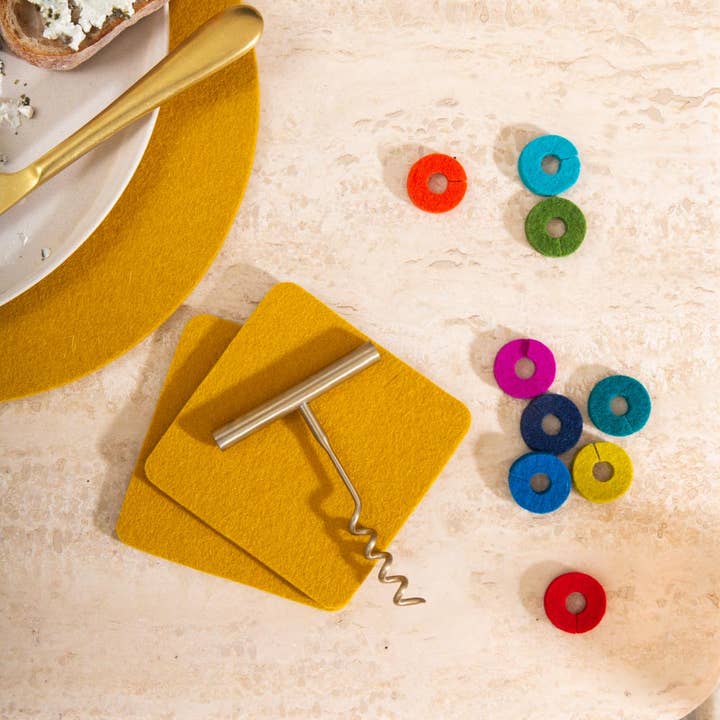 Paradise Wine-O's Merino Wool Felt Round Wine Markers for wholesale on Faire2