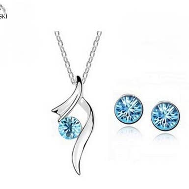Women's silver jewelry set with original aquamarine crystals for wholesale by HTB