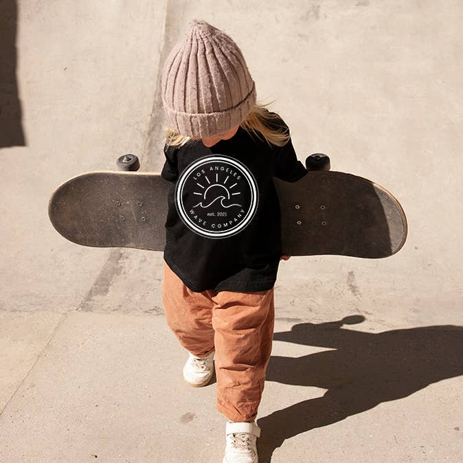 “LA Wave Co Circular Logo" Little Babe Tees and Onesies for wholesale by L.A. Wave Co.