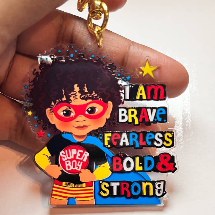 Mixed Race Boy Superhero Keyring – Affirmation Bag Charm by Fefus Designs for wholesale by Fefus Designs