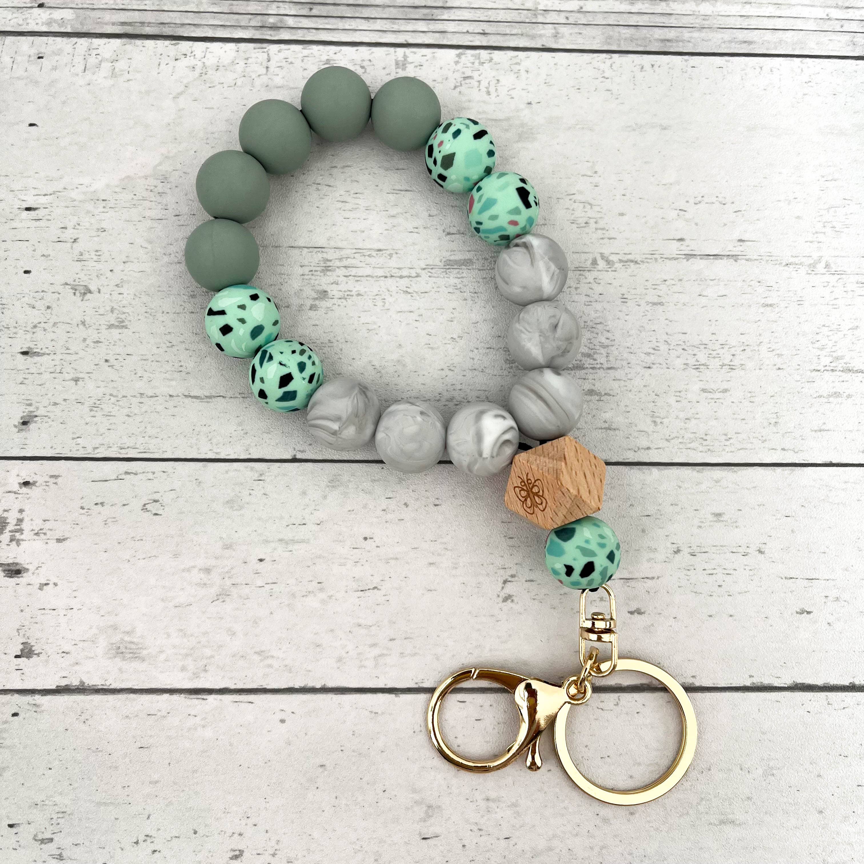 SoapElenGlen - Venta al por mayor Pulseras llavero - Pulsera de llavero con cuentas de silicona de camuflaje y dije2