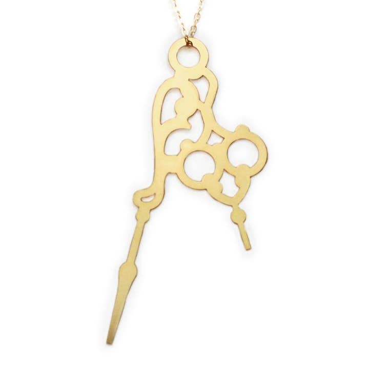 Collier à breloques vintage Horo 5 pour la vente par Brevity.