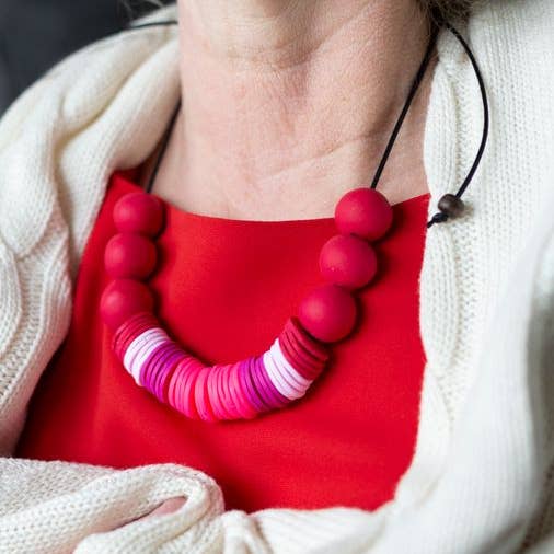 Red & neon pink adjustable disc necklace for wholesale by Nine Angels