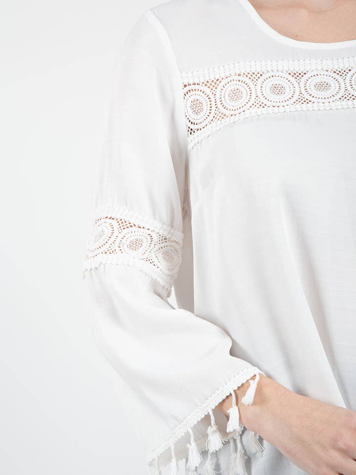 BIANCO Blusa con ricamo in vendita all'ingrosso su Faire2