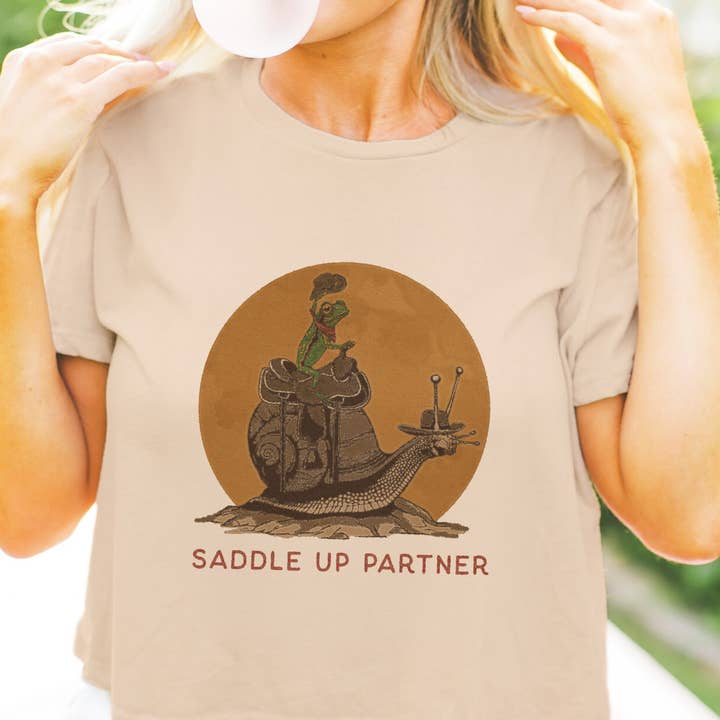 Saddle Up Partner Snail and Frog Cowboy Boxy Crop Top for wholesale by Cluster Funk Studio