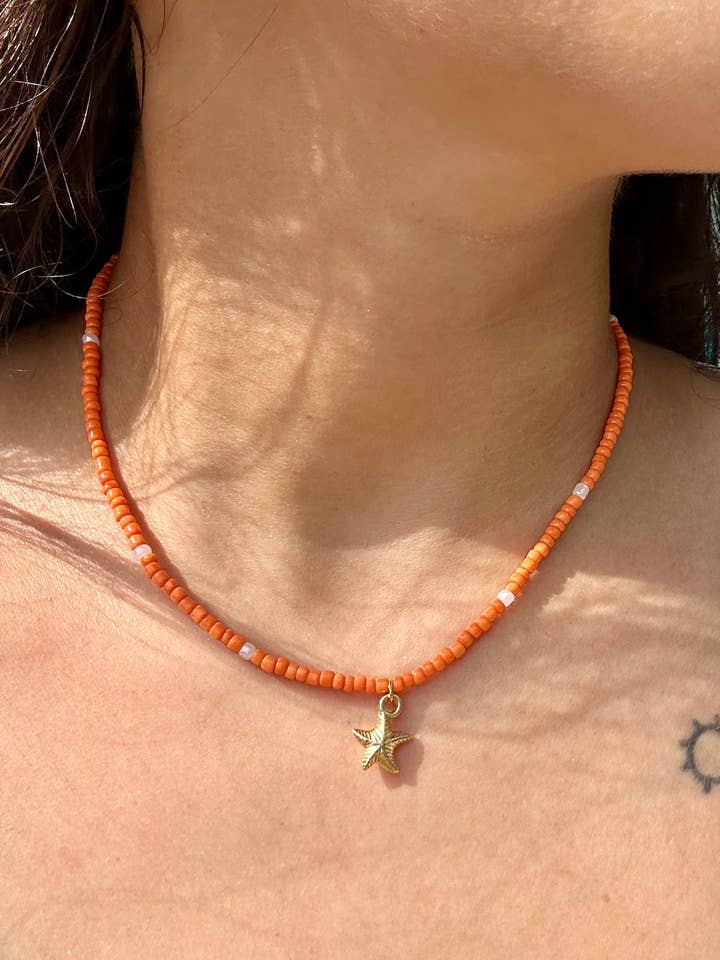 Collana con Stella Arancione per la vendita all'ingrosso da parte di Ka_Creative_Art