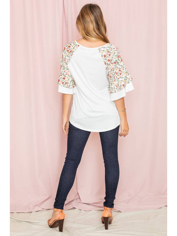 Elfenbein Tunika mit doppelter Rüschenärmel und Blumen für den Großhandel auf Faire2