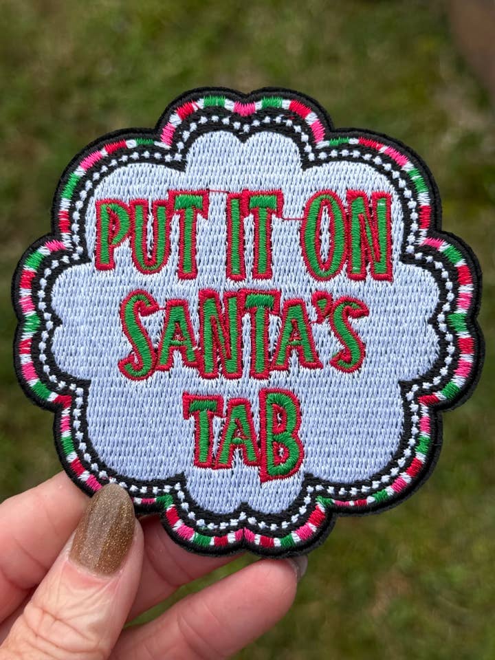 3.5” Put it on Santa’s Tab Embroidery Hat Patch for wholesale by Ohh Seaux Cute