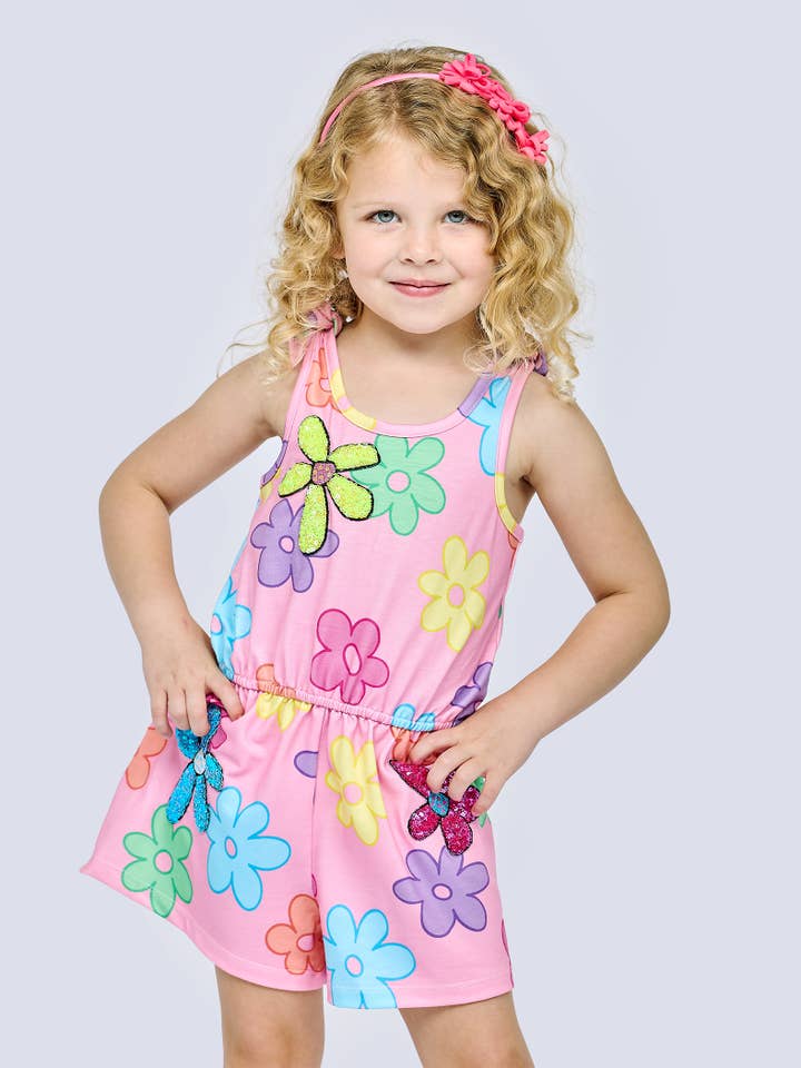 PINK MULTI FLOWER PRINT ROMPER W/ FLOWER TRIM DETAIL for wholesale on Faire