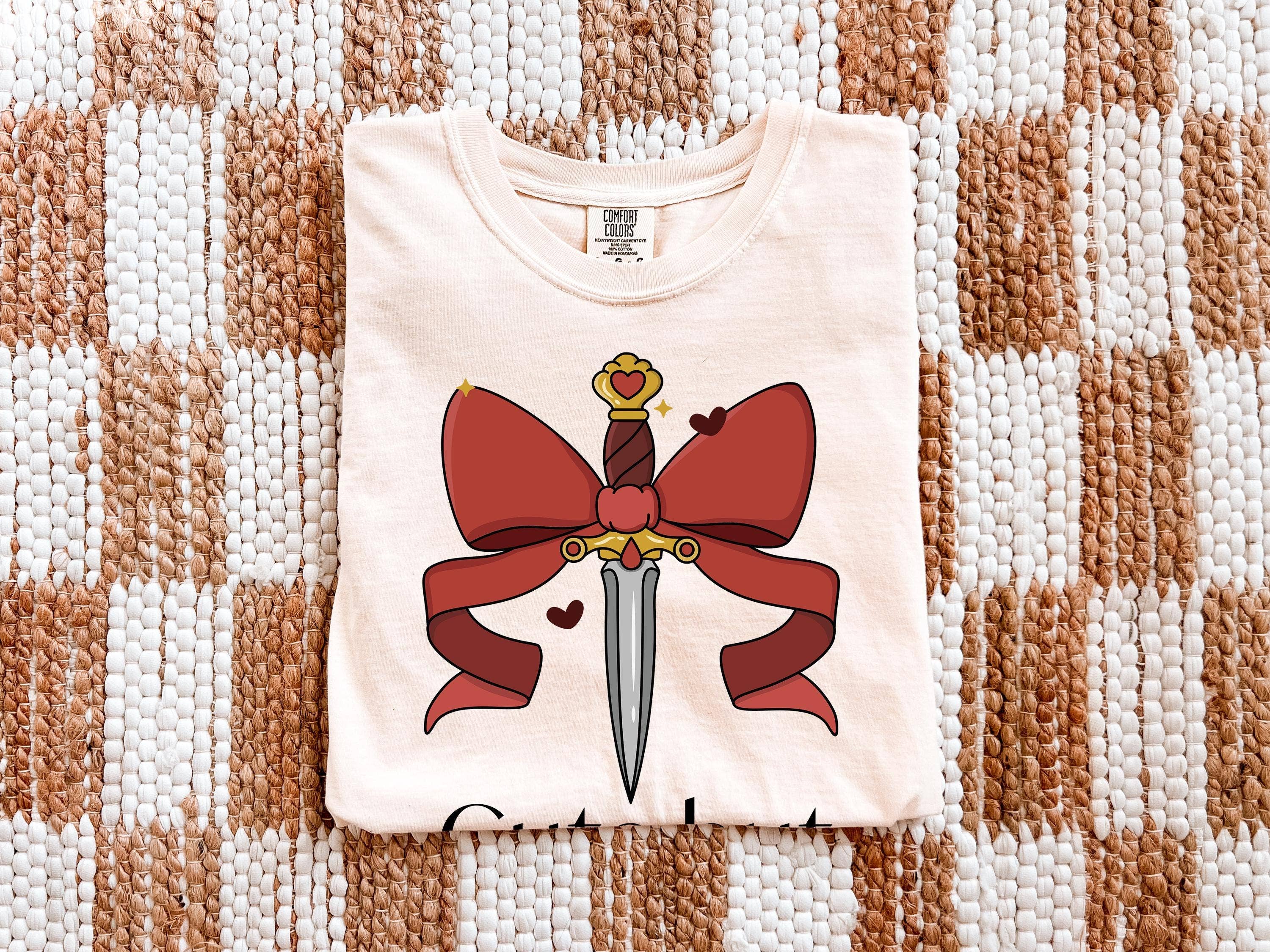 Keen Bee Studio - Wholesale Tunic - Women's - Dagger And Bows T-Shirt – Unisex Garment Dyed Shirt With Unique Lived-In Look2