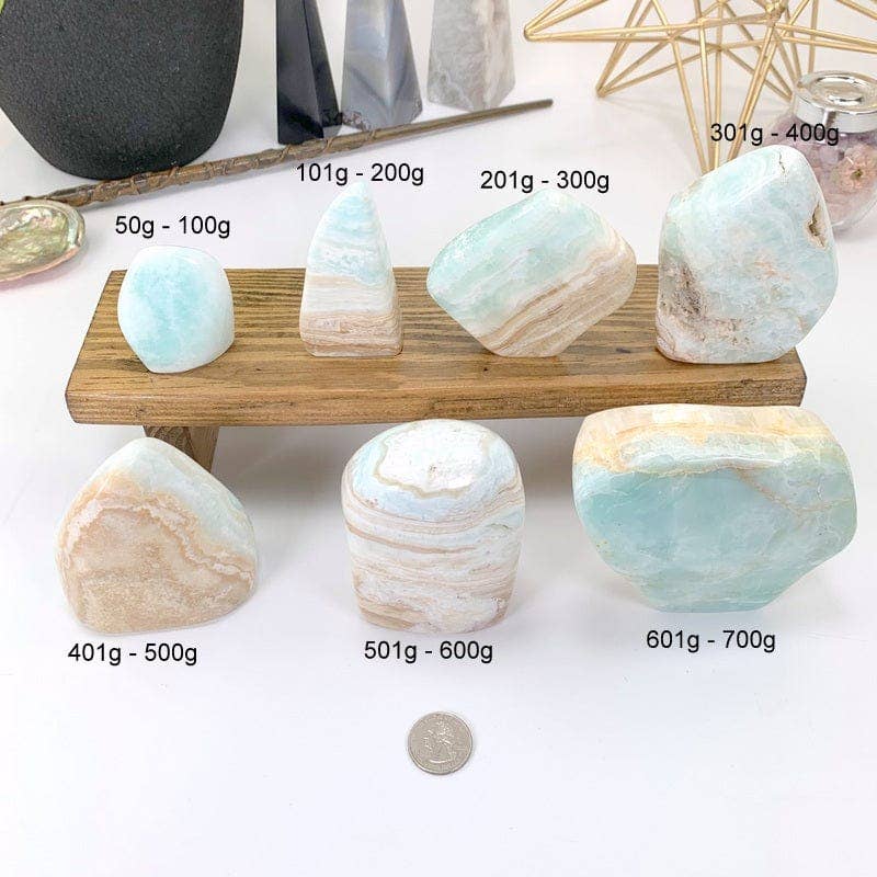 Rock Paradise - Vente Pierre et cristal de spiritualité - Base taillée en calcite des Caraïbes polie - Aragonite bleue au poids5