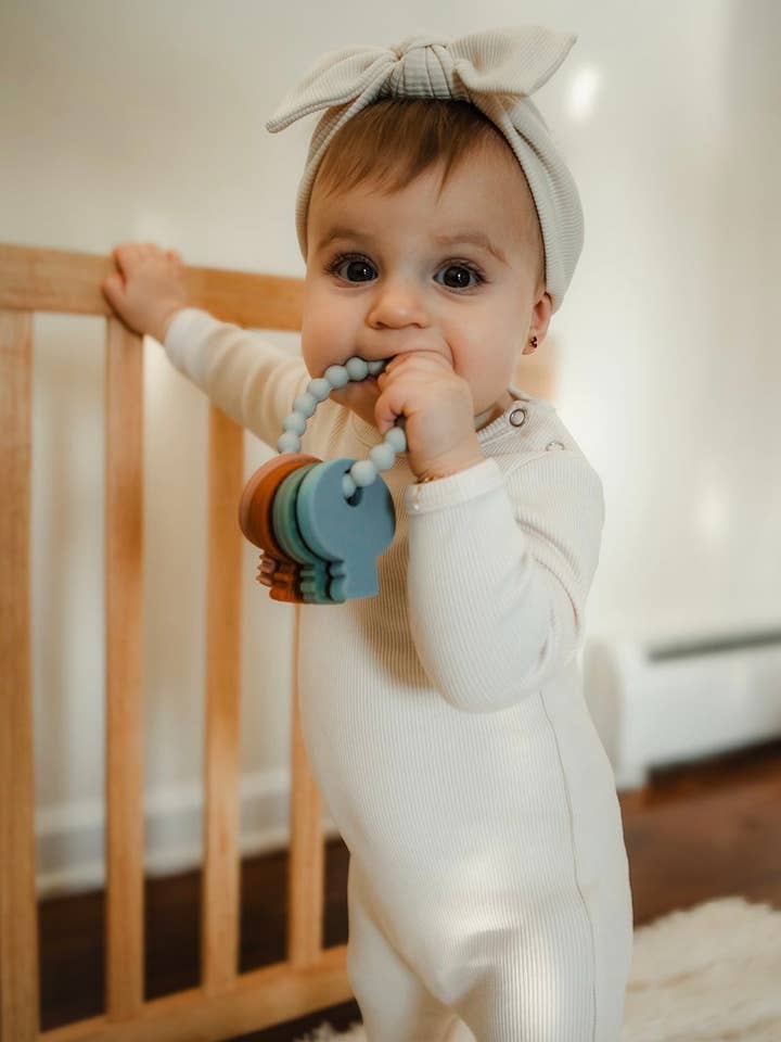 Ivory Ribbed Footie for wholesale by Niche bebe