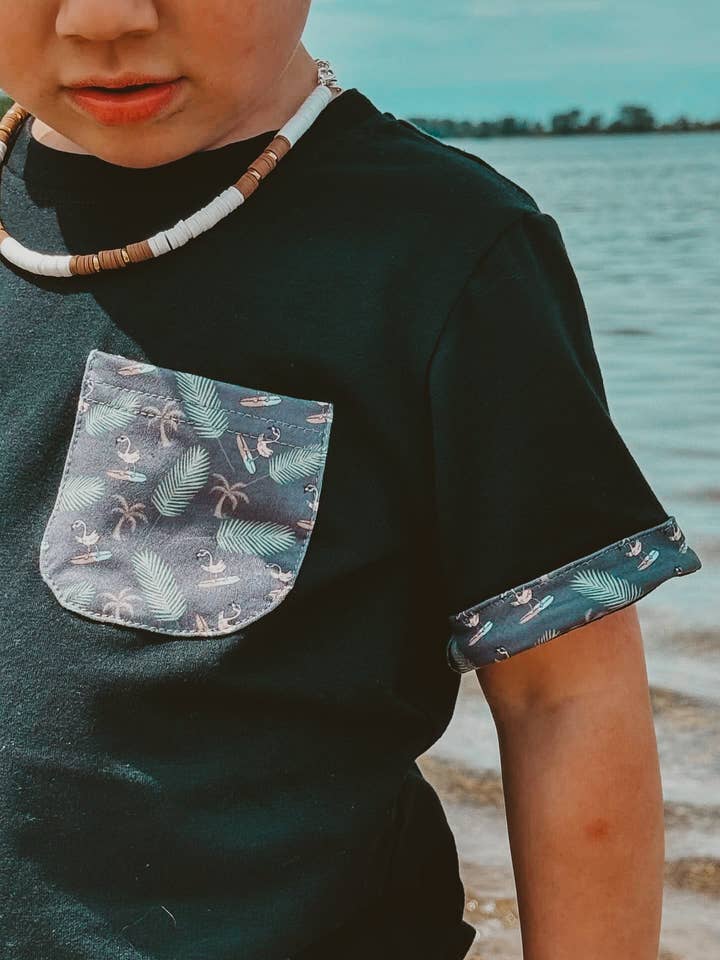 Surfin' Flamingo - Pocket Tee for wholesale by Tiny Trends Co