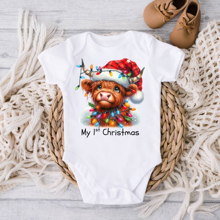 My 1st Christmas Highland Heifer Cow with Lights Onesie for wholesale by AvaryMaeInspirations