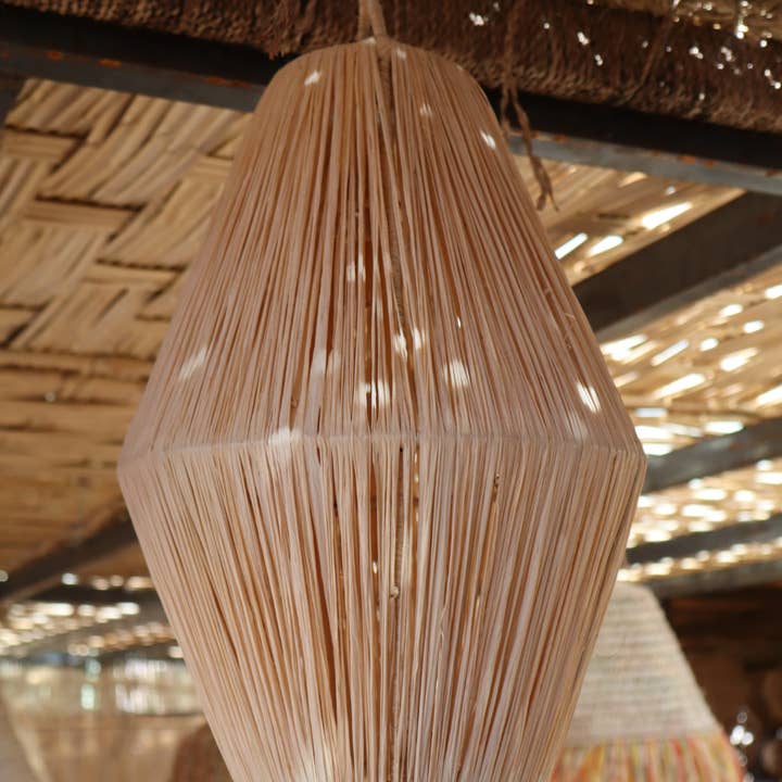 Handmade bohemian minimalist conical raffia pendant light and other Purchase Wholesale décoration bohème. Free Returns & Net 60 Terms on Faire trending on Faire.