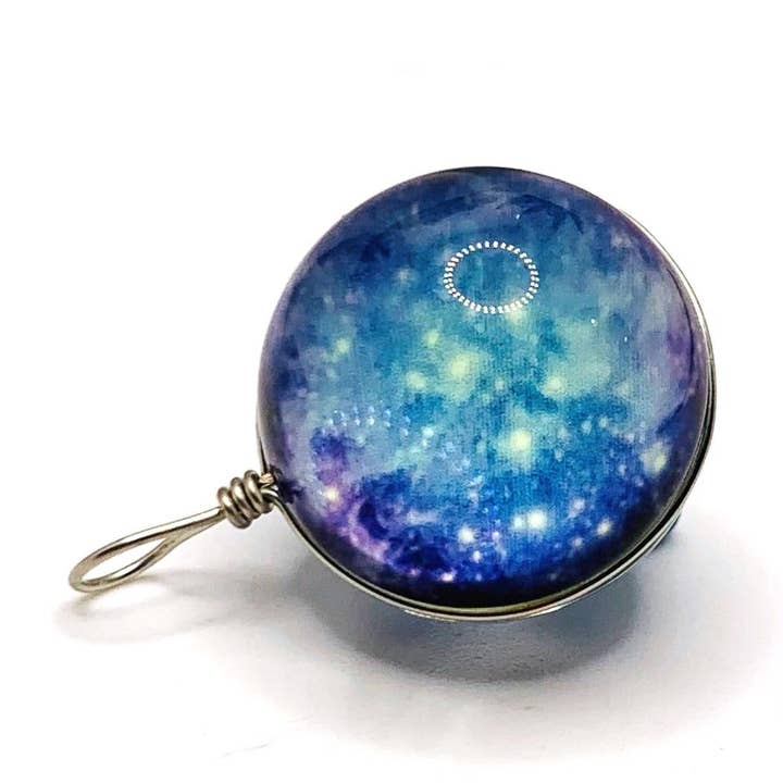 Wire Wrapped Glass Blue Galaxy Nebula Pendant Charms, 28x20mm and other Purchase Wholesale nebula. Free Returns & Net 60 Terms on Faire trending on Faire.