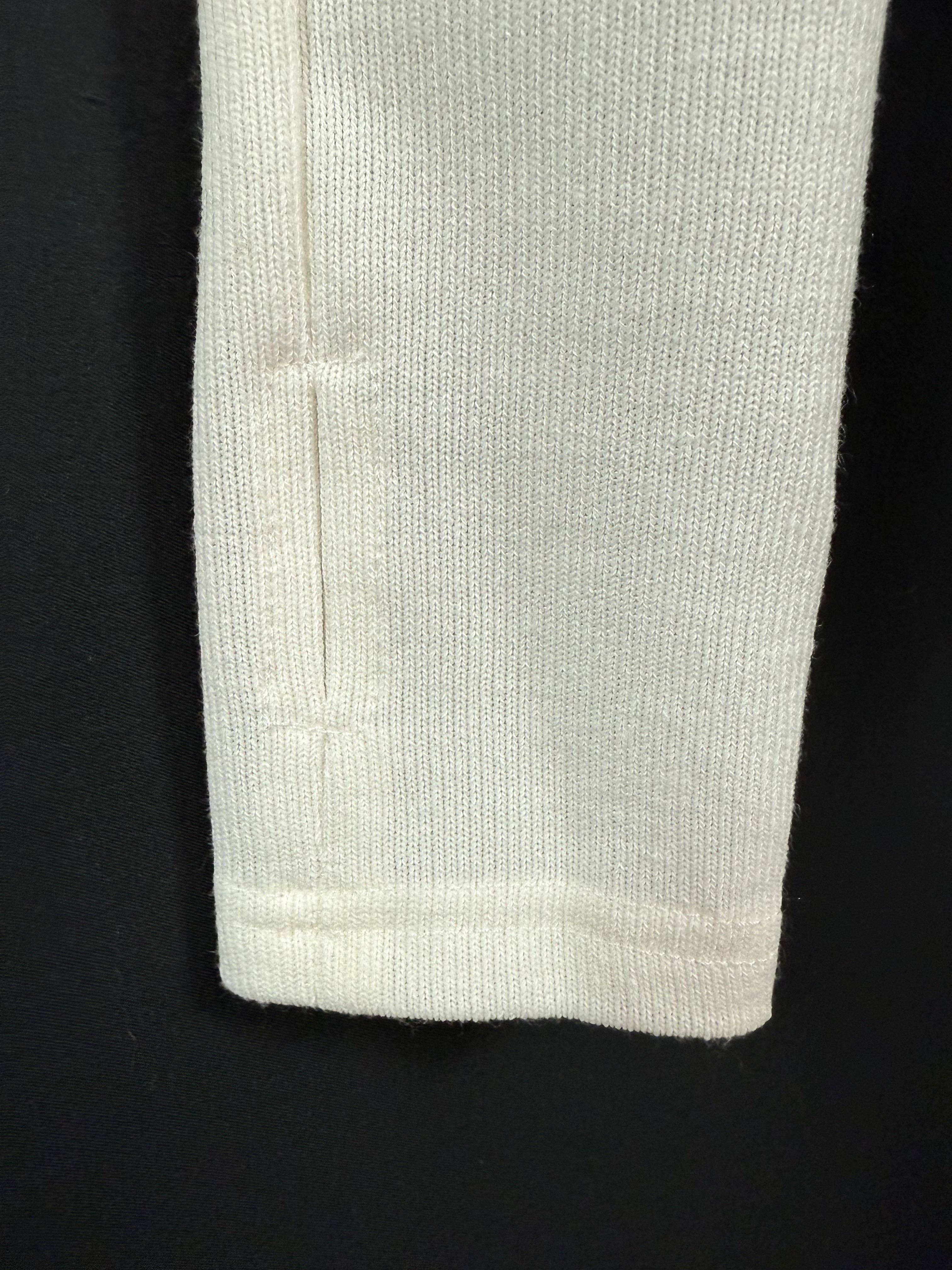 natilla Camiseta boska de manga larga ajustada con ojal para pulgar de venta al por mayor en Faire4