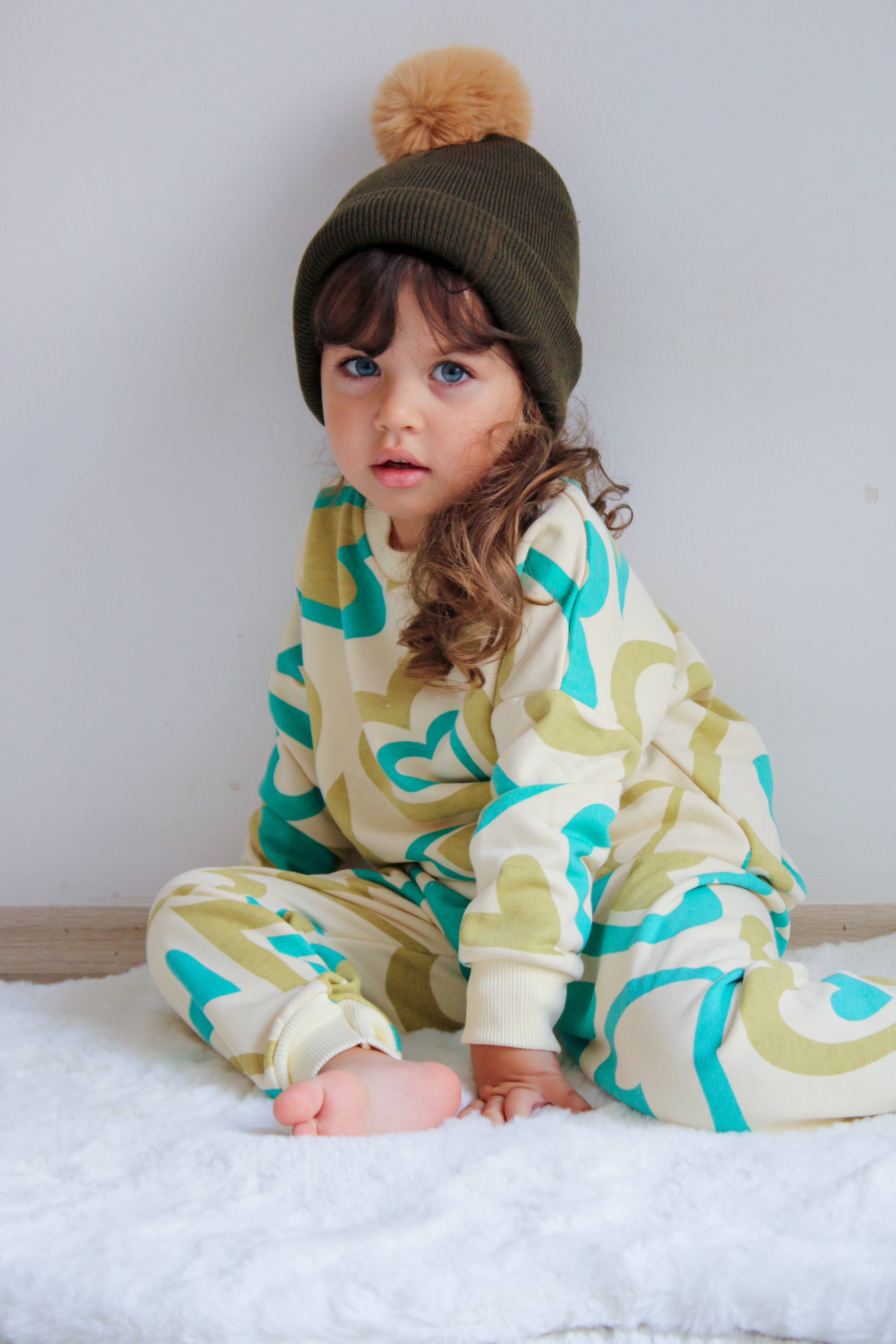 Camel Single Pom Pom Baby/Kid's Green Beanie Hat, 0 to 8 Years for wholesale on Faire