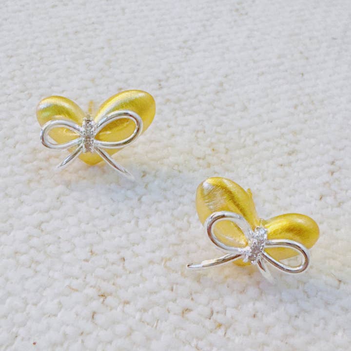 Gold Heart Bow Stud Earrings – Elegant Mixed-Metal Studs with Silver Bow Detail for wholesale by Ellison+Young
