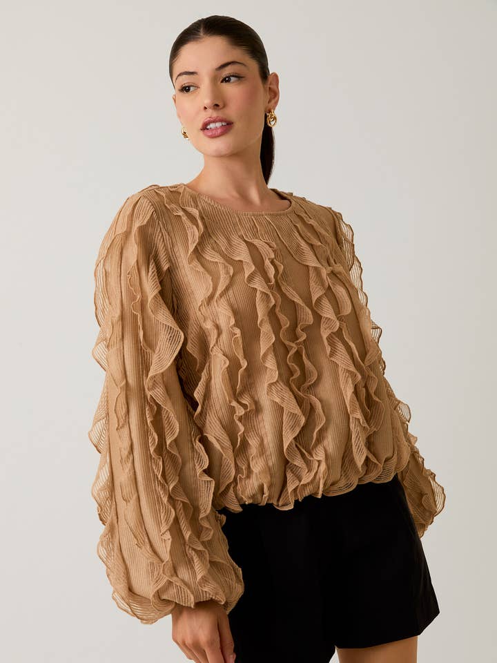 BLOUSE TEXTURÉE À MANCHES LONGUES ET COL ROND pour la vente par Sunday Edition