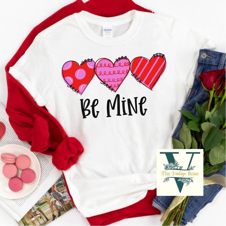 Be Mine Hearts Graphic Tee for wholesale by The Vintage Rose