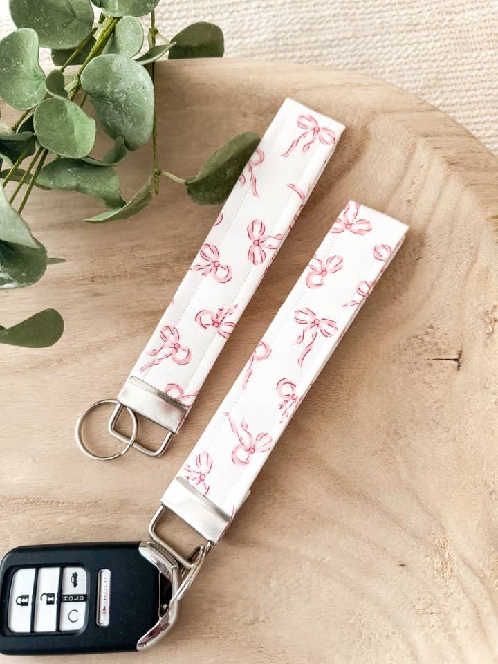 Pink Bow Keychain Wristlet for wholesale by Peachy Daze Boutique