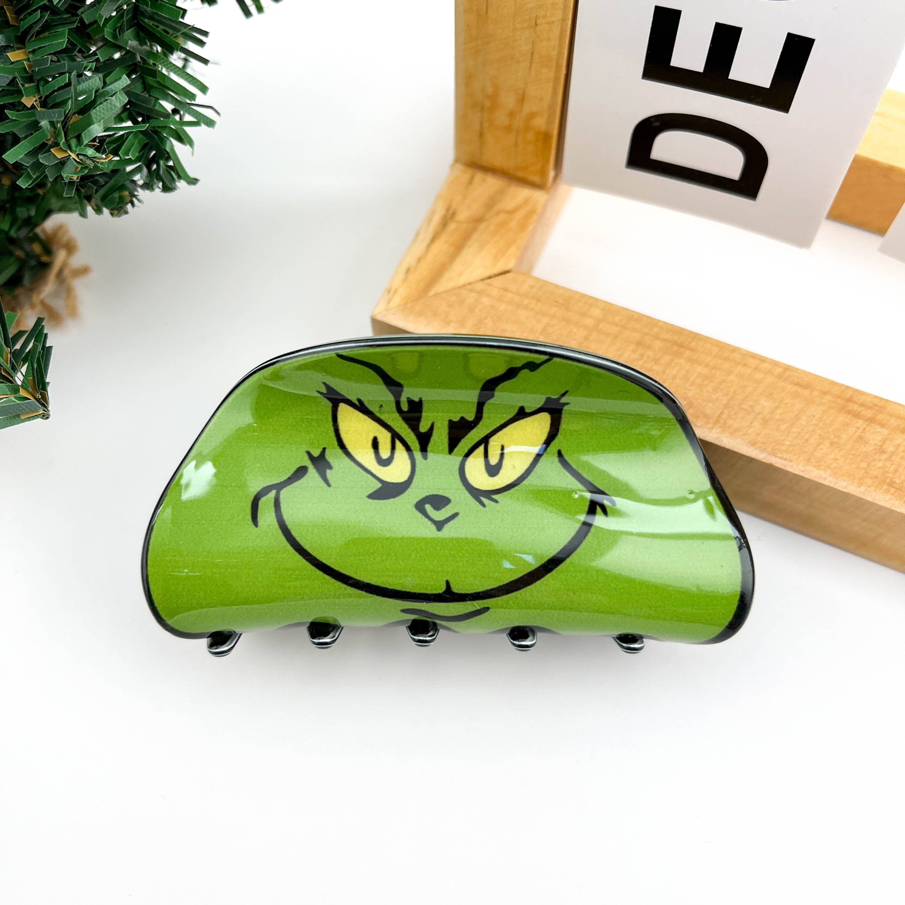 Groen Green Goblin gezicht haarclip met klauw voor groothandel op Faire5